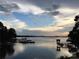 Calm lake view with docks and serene waterfront living at dusk at 17811 Half Moon Ln # C, Cornelius, NC 28031