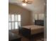 Bedroom with vaulted ceiling and large windows with plantation shutters at 17811 Half Moon Ln # C, Cornelius, NC 28031