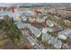Overhead shot of condos, tennis court, and Lake Norman in a lakeside community at 18832 Nautical Dr # 44, Cornelius, NC 28031