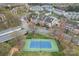A lovely aerial view of the community, tennis court, and condo buildings at 18832 Nautical Dr # 44, Cornelius, NC 28031