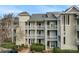 A street view of attractive condo buildings with multiple balconies at 18832 Nautical Dr # 44, Cornelius, NC 28031