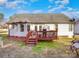 Backyard features a deck with seating areas, perfect for outdoor entertaining at 1896 Independence Sq, Kannapolis, NC 28081