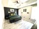 Modern bedroom with tray ceilings, neutral walls, and stylish furniture at 1896 Independence Sq, Kannapolis, NC 28081