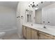Bathroom featuring double vanity with tan cabinetry and a shower and bathtub combination at 196 Gabriel Dr, Mooresville, NC 28115