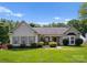 Charming single-story home with manicured lawn and mature landscaping at 196 Gabriel Dr, Mooresville, NC 28115
