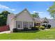 Attractive single-story home with shutters, lush lawn, and mature landscaping at 196 Gabriel Dr, Mooresville, NC 28115
