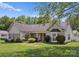 Beautiful single-story home with a manicured lawn and a welcoming front porch at 196 Gabriel Dr, Mooresville, NC 28115