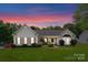 Charming single-story home with manicured lawn and landscaping in a tranquil setting at 196 Gabriel Dr, Mooresville, NC 28115