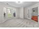 Bright living room with bay window, plush carpeting, and neutral walls for a cozy and inviting atmosphere at 196 Gabriel Dr, Mooresville, NC 28115