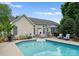 Backyard swimming pool with lounge chairs and outdoor seating, perfect for outdoor relaxation at 196 Gabriel Dr, Mooresville, NC 28115