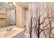 Bathroom featuring decorative shower curtain, vanity, and a standard showerhead at 200 Elizabeth Dr, Stanfield, NC 28163