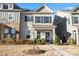 Charming two-story home with gray shutters, covered front porch, and winter landscaping at 2147 Stevens Mill Rd, Matthews, NC 28104