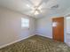 Bedroom with neutral paint, and bright ceiling fan at 2310 Clay St, Kannapolis, NC 28083