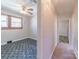 Bedroom featuring a ceiling fan, two windows and patterned carpeting at 2310 Clay St, Kannapolis, NC 28083