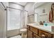 Well-lit bathroom features a shower-tub combination, vanity, and stylish decor at 255 Dorothy Dr, China Grove, NC 28023