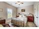 Serene bedroom with a wrought iron bed frame and matching bedside tables at 255 Dorothy Dr, China Grove, NC 28023
