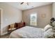 Inviting bedroom offers a cozy chair, nice light, and warm neutral walls at 255 Dorothy Dr, China Grove, NC 28023