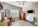 Bright bedroom featuring neutral walls, a ceiling fan, and hardwood floors at 255 Dorothy Dr, China Grove, NC 28023