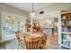 Cozy dining area with hardwood floors adjacent to an open kitchen, perfect for entertaining and Gathering meals at 255 Dorothy Dr, China Grove, NC 28023