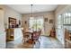Cozy dining room featuring a round table, wood chairs, and lots of natural light at 255 Dorothy Dr, China Grove, NC 28023
