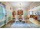 Bright dining room with a chandelier, hardwood floors, and an open layout, perfect for entertaining and Gathering meals at 255 Dorothy Dr, China Grove, NC 28023