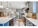 Gray kitchen features a large island, stainless steel appliances, and open layout at 255 Dorothy Dr, China Grove, NC 28023