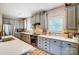 Gray kitchen with stainless appliances, subway tile backsplash, and custom cabinetry at 255 Dorothy Dr, China Grove, NC 28023