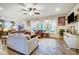 Spacious living room featuring hardwood floors, plenty of natural light, and comfortable seating arrangements for relaxation at 255 Dorothy Dr, China Grove, NC 28023
