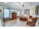 Spacious main bedroom with ample natural light, hardwood floors, and elegant furnishings for a comfortable retreat at 255 Dorothy Dr, China Grove, NC 28023