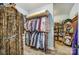 This walk-in closet features built-in shelving and plenty of room for storage at 255 Dorothy Dr, China Grove, NC 28023