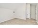 This well-lit bedroom features hardwood-look floors and crisp, clean walls at 2702 Robyns Glen Dr, Charlotte, NC 28269
