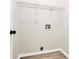 Laundry room with hookups and wire shelving at 2702 Robyns Glen Dr, Charlotte, NC 28269