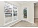 Sun room featuring bright windows with natural light and a view of the deck at 2702 Robyns Glen Dr, Charlotte, NC 28269