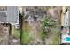 An aerial of the property, highlighting its layout, landscaping, and proximity to other homes at 312 Flint St, Charlotte, NC 28216