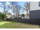 Spacious backyard featuring a wooden fence, perfect for outdoor activities at 312 Flint St, Charlotte, NC 28216