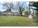 Lush backyard with shed and plenty of space for recreation at 312 Flint St, Charlotte, NC 28216