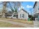 Traditional home with a covered porch and neat landscaping at 312 Flint St, Charlotte, NC 28216
