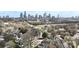 Neighborhood aerial view showcasing the city skyline in the distance at 314 Flint St, Charlotte, NC 28216