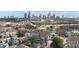 Aerial view of the neighborhood with city skyline in the background at 314 Flint St, Charlotte, NC 28216