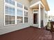 Lovely back deck with large windows offering natural light into the home at 315 Drake Park Ave, Fort Mill, SC 29708