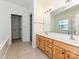 Bathroom with double sink vanity and walk in closet at 315 Drake Park Ave, Fort Mill, SC 29708