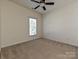 Bedroom with carpet flooring and large window that provides plenty of natural light at 315 Drake Park Ave, Fort Mill, SC 29708