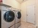 Laundry room complete with modern washer and dryer at 315 Drake Park Ave, Fort Mill, SC 29708