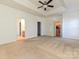 Open main bedroom featuring multiple entryways and beige carpet floors at 315 Drake Park Ave, Fort Mill, SC 29708