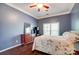 Bedroom with hardwood floors and a window with natural light at 3200 Tallia Ct, Charlotte, NC 28269