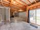 Unfinished basement space with sliding door access to the outdoors at 3449 Southern Red Oak Ln, Gastonia, NC 28056