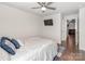 Bedroom featuring a modern ceiling fan, hardwood floors, and natural light at 3449 Southern Red Oak Ln, Gastonia, NC 28056