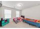 A nicely sized bedroom featuring carpet, two twin beds, and a window with blinds at 3449 Southern Red Oak Ln, Gastonia, NC 28056