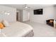 Spacious bedroom with soft carpet, a ceiling fan, and a view of the attached ensuite bathroom at 3449 Southern Red Oak Ln, Gastonia, NC 28056