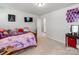 This bedroom features carpeted floors and neutral walls with an attached ensuite bathroom at 3449 Southern Red Oak Ln, Gastonia, NC 28056